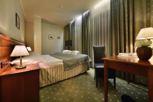 Postel nebo postele na pokoji v ubytování Hotel Morris Relax & Wellness