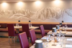 Reštaurácia alebo iné gastronomické zariadenie v ubytovaní Albergo Belvedere