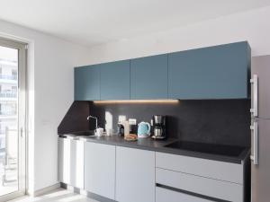 Kuchyňa alebo kuchynka v ubytovaní Nashira Apartments