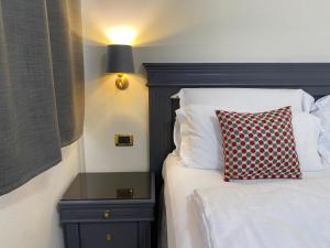 Postel nebo postele na pokoji v ubytování Hotel Estée