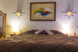Postel nebo postele na pokoji v ubytování Monte Macário Alojamento Local