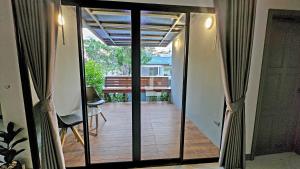 Balkón nebo terasa v ubytování I am pool villa Pattaya no11