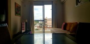 En eller flere senge i et værelse på Artigas