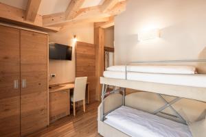 Posteľ alebo postele v izbe v ubytovaní Albergo Belvedere