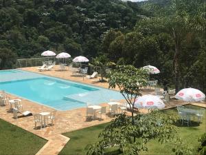 Bazén v ubytování Pousada Monte Verde nebo v jeho okolí