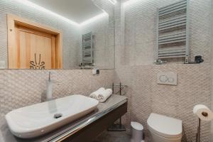 Kúpeľňa v ubytovaní Apartamenty Sobiczkowa