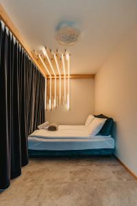 Posteľ alebo postele v izbe v ubytovaní Apartamenty Sobiczkowa