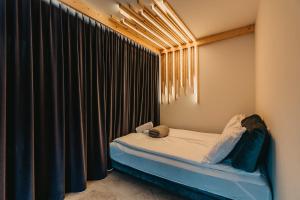 Posteľ alebo postele v izbe v ubytovaní Apartamenty Sobiczkowa + 37 fotografií