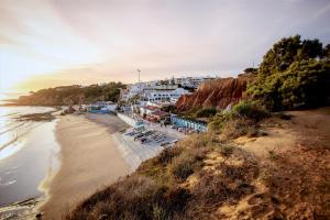 a view of a beach with a group of buildings at Aquamar Albufeira Aparthotel in Albufeira