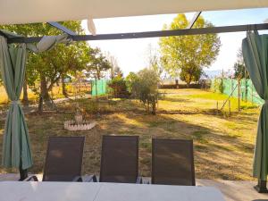 Zahrada ubytování Agradable casa con jardín: Casasola