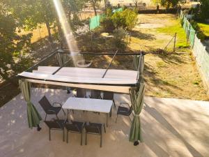 Zahrada ubytování Agradable casa con jardín: Casasola
