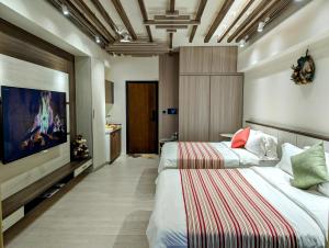 Postelja oz. postelje v sobi nastanitve 溫朵莉 Wendoly's Hot Spring Suite