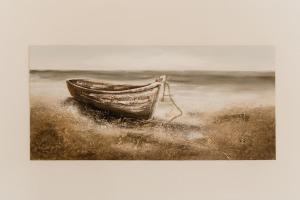 a painting of a boat on a beach at The Sea Deck Apartment - Westbrook Bay Beach - By Goldex Coastal Breaks in Kent