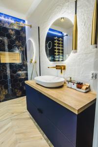 Ένα μπάνιο στο Apartament Rajskie na Wydmie