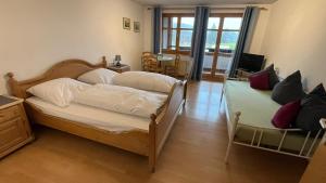Postel nebo postele na pokoji v ubytování Landgasthof Jägerhaus