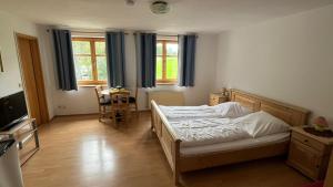 Postel nebo postele na pokoji v ubytování Landgasthof Jägerhaus