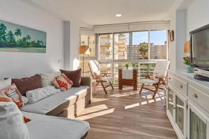 A seating area at Apartamento Amador frente al Mar