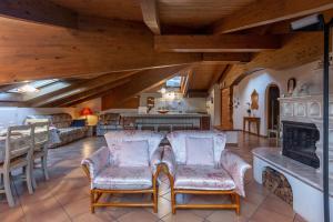 Posezení v ubytování DolomiApartments - Casa Margherita