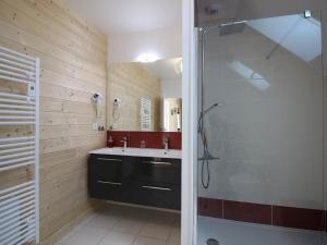 a bathroom with a shower and a sink at Chalet Mont-Dore, 5 pièces, 10 personnes - FR-1-608-206 in Le Mont-Dore