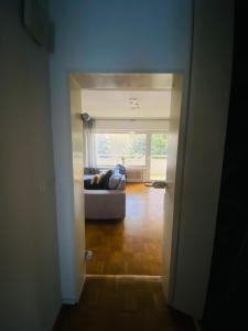 a view of a living room with a couch at Zentral gelegenes Apartment - DSL, Küche, Balkon, Parkplatz in Lüdenscheid