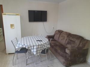 Μια τηλεόραση ή/και κέντρο ψυχαγωγίας στο QUITINETE DO AMORIM