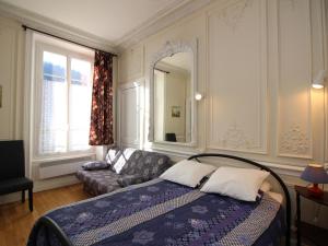 Postel nebo postele na pokoji v ubytování Appart. T2 au Mont-Dore, 4 pers., parc et montagne - FR-1-608-115