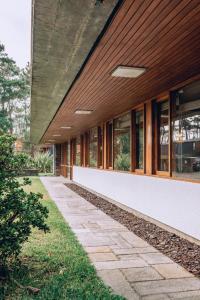 an external view of a building with windows at Parque do Rio Hotel in Esposende