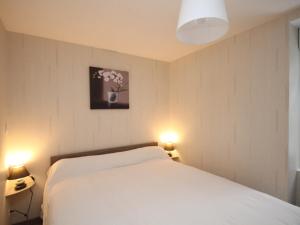 Postel nebo postele na pokoji v ubytování Mont-Dore: Grand T4 Hyper Centre avec WIFI - FR-1-608-27