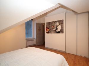 Postel nebo postele na pokoji v ubytování Mont-Dore: Beau T3 bis hyper centre avec wifi - FR-1-608-42