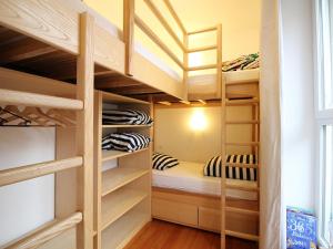 a walk in closet with bunk beds at Appartement La Bourboule, 3 pièces, 5 personnes - FR-1-608-96 in La Bourboule