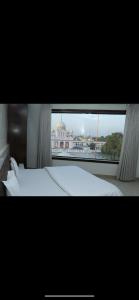 Hotel temple view inn客房内的一张或多张床位