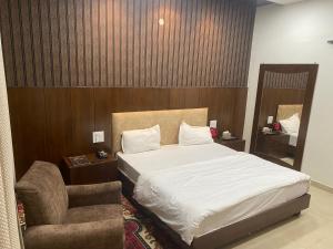 Un ou plusieurs lits dans un hébergement de l'établissement Hotel temple view inn