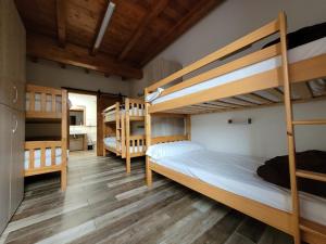 Postel nebo postele na pokoji v ubytování La Cala Hostel