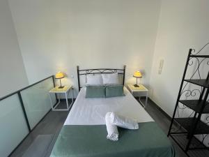 Posteľ alebo postele v izbe v ubytovaní DreamsApt Curtidores 6 Suites AT