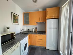 Kuchyňa alebo kuchynka v ubytovaní DreamsApt Curtidores 6 Suites AT