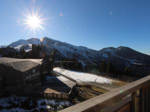 a view of a mountain with the sun in the sky at Appartement Avoriaz, 3 pièces, 6 personnes - FR-1-633-31 in Avoriaz