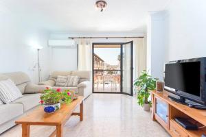 Televízia a/alebo spoločenská miestnosť v ubytovaní G2 Práctico Apartamento en Mallorca cerca de las mejores playas
