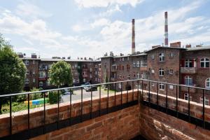 a view from the balcony of an apartment building at Kolorowy apartament A9 Katowice Nikiszowiec in Katowice