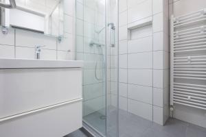 Koupelna v ubytování 4gZg Apartment + 5 fotografií