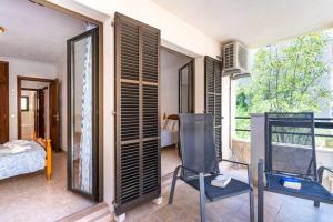 Postel nebo postele na pokoji v ubytování M0 Práctico y Sencillo Apartamento a 100 m de las mejores playas de Mallorca
