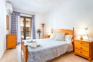 Postel nebo postele na pokoji v ubytování M0 Práctico y Sencillo Apartamento a 100 m de las mejores playas de Mallorca