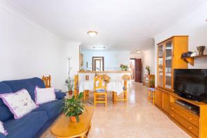 TV a/nebo společenská místnost v ubytování M0 Práctico y Sencillo Apartamento a 100 m de las mejores playas de Mallorca