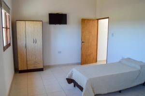 La Justina - Alquiler Temporario tesisinde bir odada yatak veya yataklar