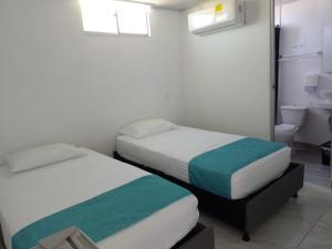 Postelja oz. postelje v sobi nastanitve Sky view hotel tolu