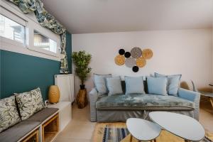 A seating area at Le Petit Jardin #2