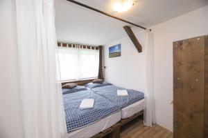 Postel nebo postele na pokoji v ubytování Chata Orlik - all inclusive & wellness