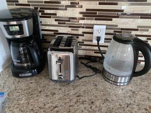 a coffee maker and a blender on a counter at ,Treasure Cay, Bahamas, Cottages Luis & Sofia, 2 Bed 2 Bath in Treasure Cay