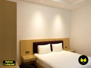 Katil atau katil-katil dalam bilik di VACA Apartments at Imperial Suites