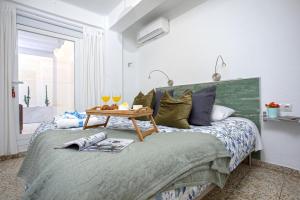 Posteľ alebo postele v izbe v ubytovaní -MalagaSunApts-Merced Private Terrace