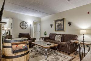 a living room with a couch and a table at Gatlinburg Towers Condo Unit 501 - Great Location! Close to Town! condo in Gatlinburg